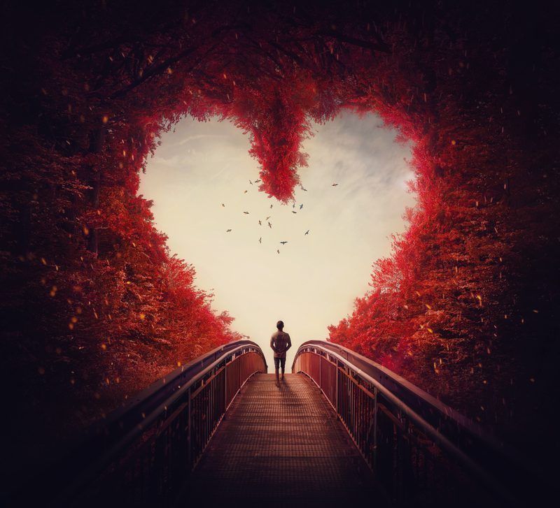 A bridge and heart-shaped light symbolizing the path of conscious relationships
